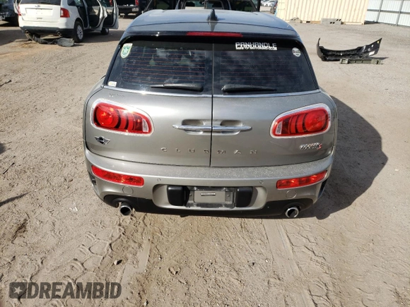 2017 MINI Clubman Cooper S with VIN WMWLU5C36H2E83921, listed as a Copart auction lot 79326784 with 133,564 mi miles and Salvage Title. Bid and sale history available at carsss.com. Image 6.