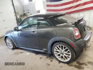 2012 MINI Coupe S z VIN WMWSX3C50CT154835, wystawiony jako Copart lot #76659984 z przebiegiem 122 425 mil mil oraz Szkody całkowita. Historia ofert i sprzedaży dostępna na DreamBid. Obrazek 2.