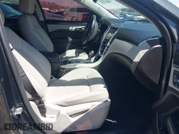 2014 Cadillac SRX z VIN 3GYFNAE35ES610751, wystawiony jako IAAI lot #41832296 z przebiegiem 133 293 mil mil oraz . Historia ofert i sprzedaży dostępna na DreamBid. Obrazek 5.