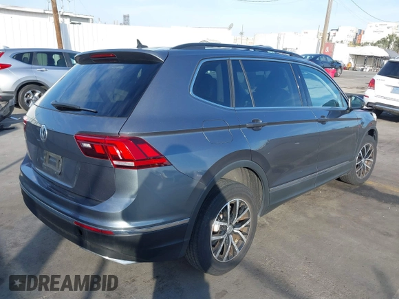 2021 Volkswagen Tiguan SE with VIN 3VV3B7AX8MM071303, listed as a IAAI auction lot 41109686 with 40,684 mi miles and . Bid and sale history available at DreamBid. Image 4.