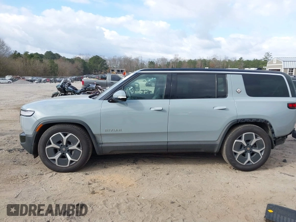 2024 Rivian R1S Adventure with VIN 7PDSGBBA1RN040036, listed as a IAAI auction lot 41694635 with 13,855 mi miles. Bid and sale history available at carsss.com. Image 15.