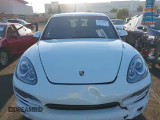 2014 Porsche Cayenne with VIN WP1AA2A28ELA96123, listed as a IAAI auction lot 42010456 with 154,312 mi miles and . Bid and sale history available at DreamBid. Image 13.