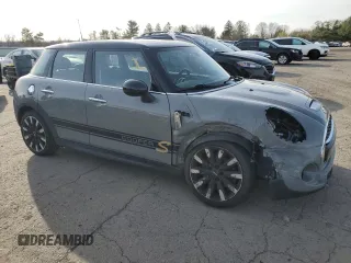 2018 MINI Hardtop 4 Door Cooper S с VIN WMWXU3C58J2F50385, выставлен на аукционе Copart как лот 51168775 с пробегом 77 091 миль миль и Списание • Salvage title. История ставок и продаж доступна на DreamBid. Изображение 4.