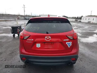 2014 Mazda CX-5 Touring with VIN JM3KE2CY2E0322211, listed as a IAAI auction lot 41721219 with 127,312 mi miles. Bid and sale history available at carsss.com. Image 16.