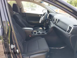 2017 Kia Sportage LX z VIN KNDPMCAC1H7285906, wystawiony jako IAAI lot #42399031 z przebiegiem 142 909 mil mil oraz . Historia ofert i sprzedaży dostępna na DreamBid. Obrazek 5.