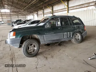 1996 Jeep Grand Cherokee Laredo с VIN 1J4GZ58S6TC304597, выставлен на аукционе Copart как лот 52962545 с пробегом Не указан миль и Списание • Salvage title. История ставок и продаж доступна на DreamBid. Изображение 1.