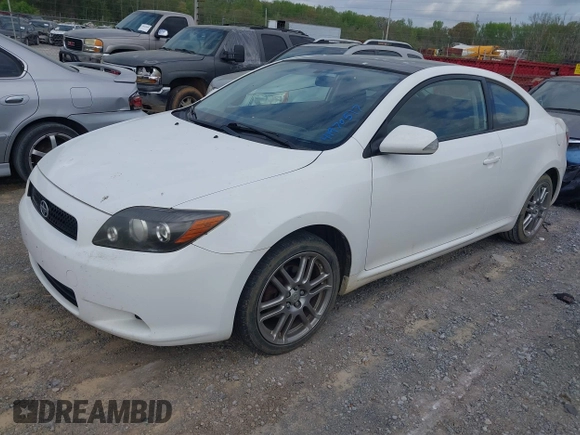 2010 Scion tC with VIN JTKDE3B79A0313508, listed as a IAAI auction lot 41970517 with 163,604 mi miles. Bid and sale history available at carsss.com. Image 2.