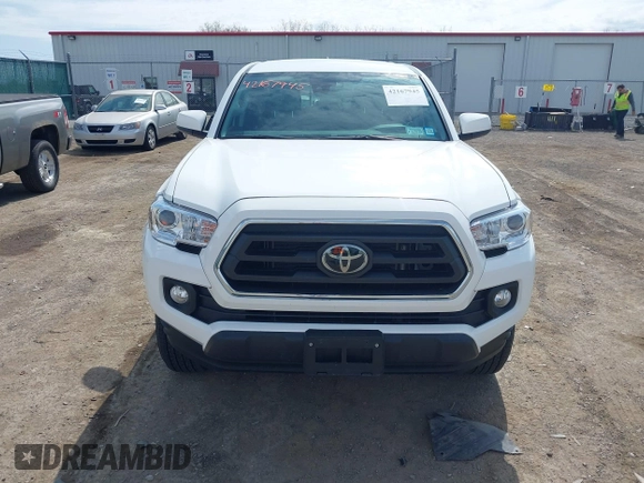 2023 Toyota Tacoma SR with VIN 3TMCZ5AN2PM642205, listed as a IAAI auction lot 42167945 with 10,595 mi miles and . Bid and sale history available at DreamBid. Image 13.