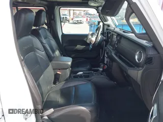 2019 Jeep Wrangler Unlimited Sahara with VIN 1C4HJXENXKW684942, listed as a IAAI auction lot 42021869 with 55,137 mi miles and . Bid and sale history available at DreamBid. Image 5.