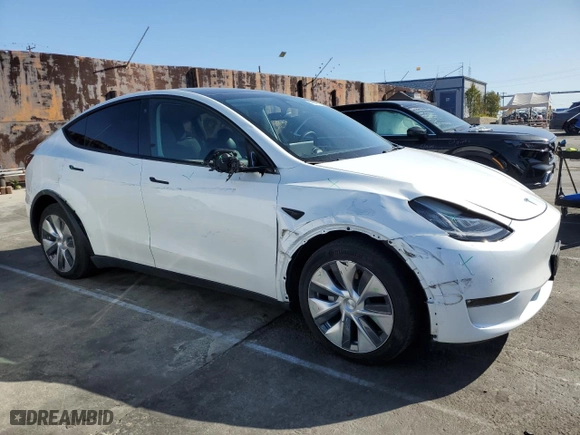 2022 Tesla Model Y Long Range with VIN 7SAYGDEE3NF370431, listed as a Copart auction lot 48947975 with 13,419 mi miles and Salvage Title. Bid and sale history available at carsss.com. Image 4.
