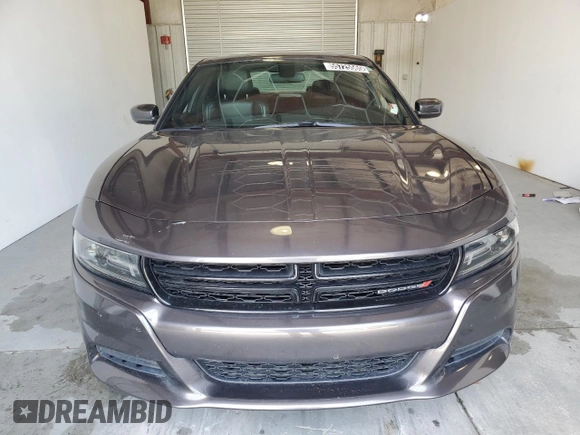 2020 Dodge Charger SXT z VIN 2C3CDXBG1LH116252, wystawiony jako Copart lot #55725565 z przebiegiem 95 039 mil mil oraz Czysty tytuł • Clean title. Historia ofert i sprzedaży dostępna na DreamBid. Obrazek 5.