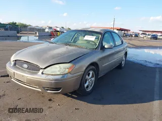 2004 Ford Taurus SES with VIN 1FAFP55S74A116833, listed as a IAAI auction lot 39086934 with Not provided miles and . Bid and sale history available at DreamBid. Image 2.