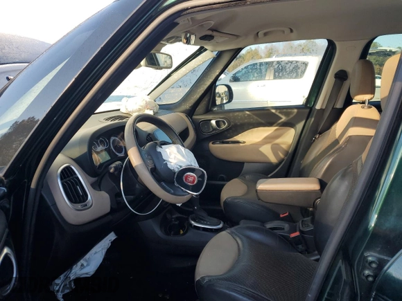 2014 FIAT 500L Lounge with VIN ZFBCFACH9EZ022054, listed as a Copart auction lot 83541054 with 125,729 mi miles and Salvage Title. Bid and sale history available at DreamBid. Image 7.