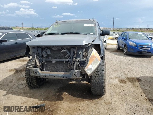 2015 Nissan Titan SL with VIN 1N6AA0ED5FN510723, listed as a Copart auction lot 60952184 with 177,435 mi miles and Salvage Title. Bid and sale history available at carsss.com. Image 5.
