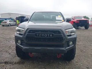 2017 Toyota Tacoma SR5 z VIN 3TMAZ5CN9HM044182, wystawiony jako IAAI lot #42116303 z przebiegiem 92 577 mil mil oraz . Historia ofert i sprzedaży dostępna na DreamBid. Obrazek 12.