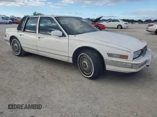 1987 Cadillac Seville z VIN 1G6KS518XHU812739, wystawiony jako Copart lot #79308574 z przebiegiem Nie podano mil oraz Szkoda całkowita • Salvage title. Historia ofert i sprzedaży dostępna na DreamBid. Obrazek 4.