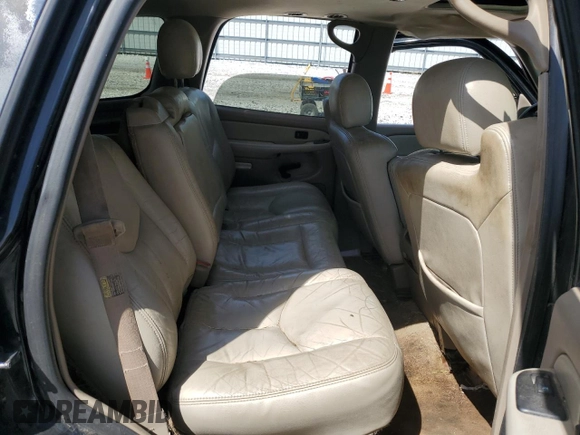 2003 GMC Yukon SLT z VIN 1GKEK13Z53J161625, wystawiony jako Copart lot #54055495 z przebiegiem 346 994 mil mil oraz Nie do naprawy • Non repairable. Historia ofert i sprzedaży dostępna na DreamBid. Obrazek 11.