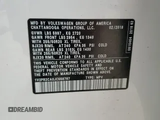 2018 Volkswagen Atlas SE z VIN 1V2PR2CA0JC558787, wystawiony jako Copart lot #50322575 z przebiegiem 104 103 mil mil oraz Szkoda całkowita • Salvage title. Historia ofert i sprzedaży dostępna na DreamBid. Obrazek 13.