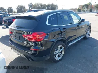 2019 BMW X3 sDrive30i with VIN 5UXTR7C5XKLR51471, listed as a IAAI auction lot 41718818 with 52,670 mi miles. Bid and sale history available at carsss.com. Image 4.