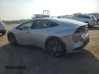 2024 Toyota Prius LE with VIN JTDADABU8R3020720, listed as a Copart auction lot 60815005 with 2,594 mi miles and Salvage title. Bid and sale history available at DreamBid. Image 2.
