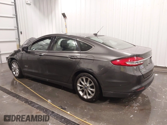 2018 Ford Fusion Energi SE with VIN 3FA6P0PU3JR203714, listed as a IAAI auction lot 41698507 with 168,609 mi miles. Bid and sale history available at carsss.com. Image 3.