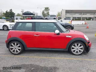 2009 MINI Cooper Hardtop S with VIN WMWMF73549TW87458, listed as a IAAI auction lot 42051759 with 135,309 mi miles. Bid and sale history available at carsss.com. Image 13.