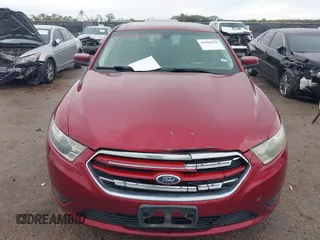 2015 Ford Taurus SEL with VIN 1FAHP2E8XFG137526, listed as a IAAI auction lot 41909658 with 147,992 mi miles and . Bid and sale history available at carsss.com. Image 12.