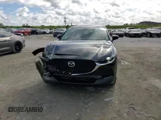 2021 Mazda CX-30 Select z VIN 3MVDMABL5MM211196, wystawiony jako Copart lot #73291012 z przebiegiem 15 871 mil mil oraz Nie do naprawy • Non repairable. Historia ofert i sprzedaży dostępna na DreamBid. Obrazek 12.