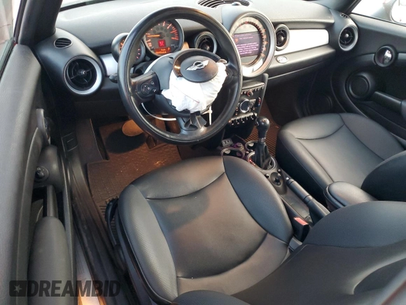 2015 MINI Convertible with VIN WMWZN3C59FT862963, listed as a Copart auction lot 86016514 with 96,493 mi miles and Salvage title. Bid and sale history available at DreamBid. Image 8.