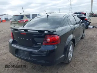 2013 Dodge Avenger SXT with VIN 1C3CDZCG5DN741112, listed as a IAAI auction lot 41838733 with 179,000 mi miles and . Bid and sale history available at carsss.com. Image 4.