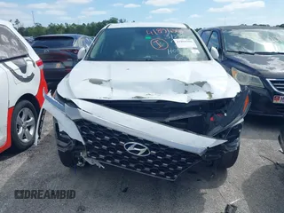 2019 Hyundai Santa Fe SEL with VIN 5NMS33AD0KH006550, listed as a IAAI auction lot 41894306 with 80,920 mi miles and . Bid and sale history available at DreamBid. Image 13.