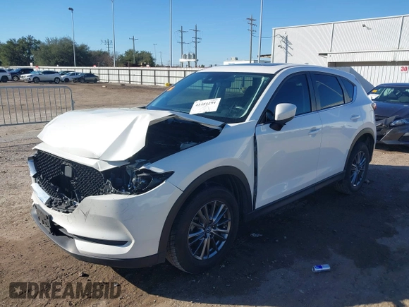 2019 Mazda CX-5 Touring with VIN JM3KFACM4K1668352, listed as a IAAI auction lot 41481291 with 65,901 mi miles and . Bid and sale history available at carsss.com. Image 17.