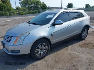 2014 Cadillac SRX Luxury Collection z VIN 3GYFNEE36ES652353, wystawiony jako IAAI lot #42233986 z przebiegiem 146 029 mil mil oraz . Historia ofert i sprzedaży dostępna na DreamBid. Obrazek 2.