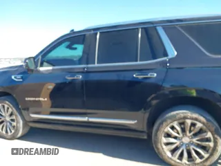 2021 GMC Yukon Denali with VIN 1GKS2DKL1MR135771, listed as a IAAI auction lot 41403680 with 61,772 mi miles. Bid and sale history available at carsss.com. Image 14.