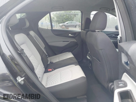 2021 Chevrolet Equinox LS z VIN 2GNAXSEV9M6142819, wystawiony jako IAAI lot #42200279 z przebiegiem 82 669 mil mil oraz . Historia ofert i sprzedaży dostępna na DreamBid. Obrazek 8.