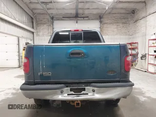 2003 Ford F-150 XLT z VIN 1FTRW08L73KC11631, wystawiony jako IAAI lot #42673130 z przebiegiem 188 945 mil mil oraz . Historia ofert i sprzedaży dostępna na DreamBid. Obrazek 16.