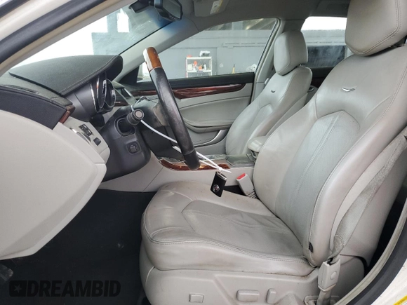 2012 Cadillac CTS Performance with VIN 1G6DJ5E31C0102123, listed as a Copart auction lot 89283265 with 133,962 mi miles and Salvage Title. Bid and sale history available at DreamBid. Image 7.