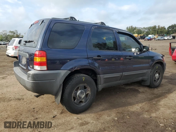 2004 Ford Escape XLS with VIN 1FMYU92104KA21454, listed as a Copart auction lot 74139564 with 217,731 mi miles and Salvage Title. Bid and sale history available at DreamBid. Image 3.