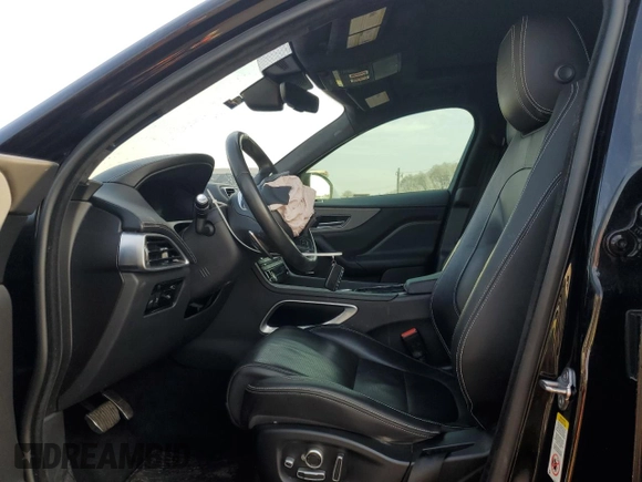 2019 Jaguar F-Pace S with VIN SADCM2FV3KA352927, listed as a Copart auction lot 49069735 with 83,317 mi miles and Salvage Title. Bid and sale history available at DreamBid. Image 7.