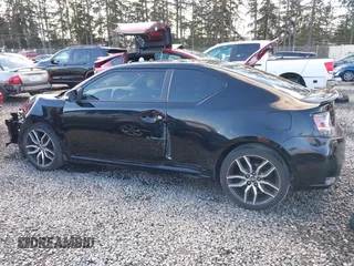2015 Scion tC z VIN JTKJF5C74FJ010874, wystawiony jako IAAI lot #41496551 z przebiegiem 132 586 mil mil oraz . Historia ofert i sprzedaży dostępna na DreamBid. Obrazek 14.