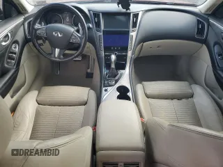 2014 Infiniti Q50 Sport with VIN JN1BV7AR6EM693711, listed as a Copart auction lot 64551895 with 124,843 mi miles and Salvage title. Bid and sale history available at DreamBid. Image 8.