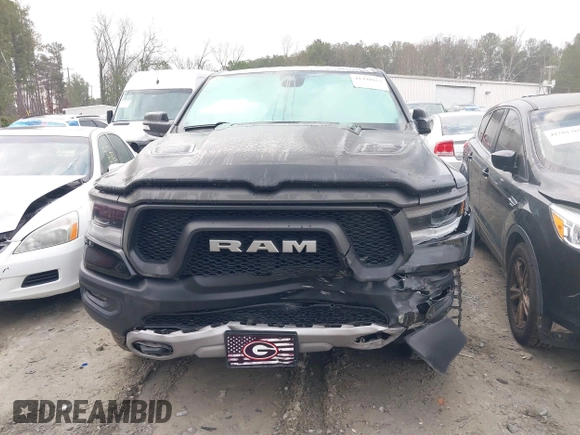 2019 Ram 1500 Rebel with VIN 1C6SRFLTXKN580782, listed as a IAAI auction lot 41498027 with 83,669 mi miles and . Bid and sale history available at DreamBid. Image 6.