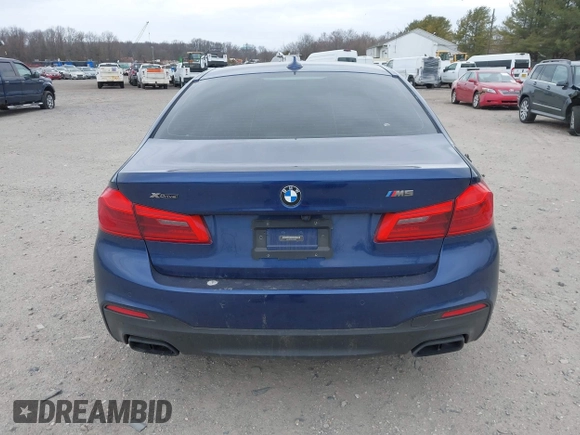 2018 BMW 5 Series M550i xDrive with VIN WBAJB9C56JG463891, listed as a IAAI auction lot 41731556 with 104,860 mi miles. Bid and sale history available at carsss.com. Image 16.