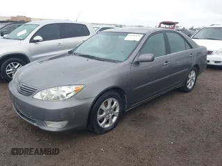 2005 Toyota Camry LE with VIN 4T1BF32K25U595176, listed as a IAAI auction lot 41932171 with 203,956 mi miles and . Bid and sale history available at DreamBid. Image 2.