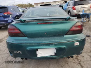 1999 Pontiac Grand Am GT with VIN 1G2NW12E5XM841080, listed as a Copart auction lot 75167674 with 1 mi miles and Salvage Title. Bid and sale history available at carsss.com. Image 10.