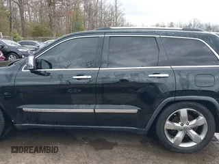 2013 Jeep Grand Cherokee Overland with VIN 1C4RJFCG8DC614542, listed as a IAAI auction lot 41733846 with 44,131 mi miles. Bid and sale history available at carsss.com. Image 14.