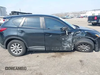 2016 Mazda CX-5 Sport with VIN JM3KE4BY3G0843177, listed as a IAAI auction lot 41804094 with 193,461 mi miles. Bid and sale history available at carsss.com. Image 13.