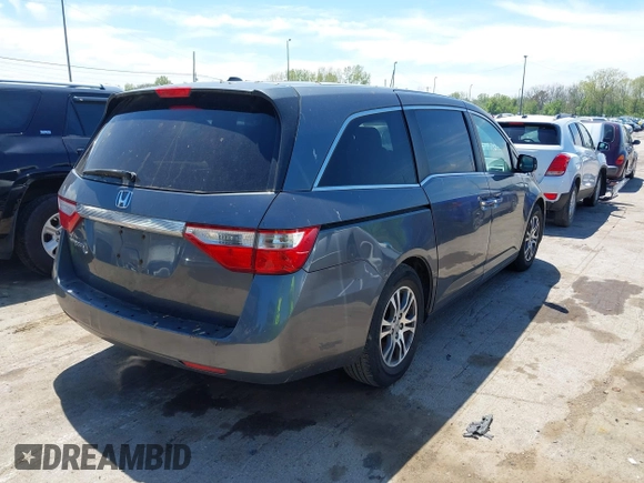 2011 Honda Odyssey EX-L with VIN 5FNRL5H62BB071404, listed as a IAAI auction lot 42196826 with 278,657 mi miles and . Bid and sale history available at carsss.com. Image 4.