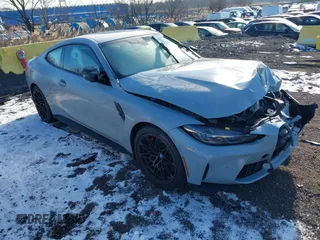 2022 BMW M4 Competition xDrive with VIN WBS43AZ04NCJ28077, listed as a IAAI auction lot 41183055 with 21,210 mi miles. Bid and sale history available at carsss.com. Image 1.
