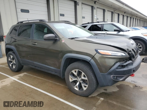 2015 Jeep Cherokee Trailhawk z VIN 1C4PJMBSXFW588030, wystawiony jako Copart lot #55057635 z przebiegiem 116 209 mil mil oraz Szkoda całkowita • Salvage title. Historia ofert i sprzedaży dostępna na DreamBid. Obrazek 4.